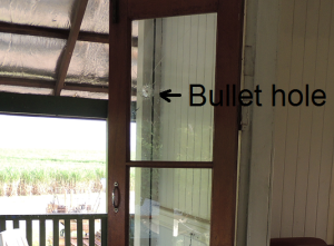 Door with bullet hole